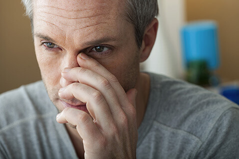 Man with sinus pain